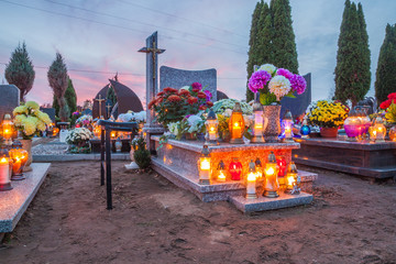 Candles Burning At a Cemetery During All Saints Day. 