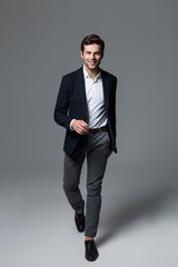 Full length portrait of a happy young businessman