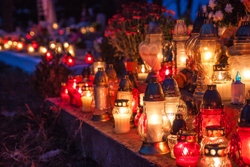 Candles Burning At a Cemetery During All Saints Day. 