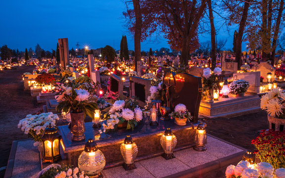 Candles Burning At a Cemetery During All Saints Day. 