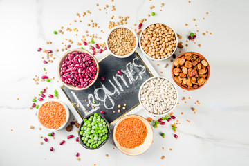 Various assortment of legumes - beans, soy beans, chickpeas, lentils, green peas. Healthy eating...