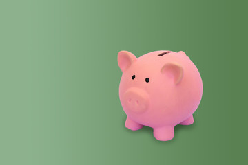 Piggy bank with green background