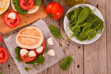 Tigella bread with spinach and tomatoes.