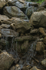 Waterfall detail on rock stone