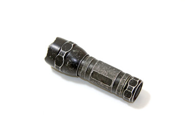 Old-fashioned pocket flashlight