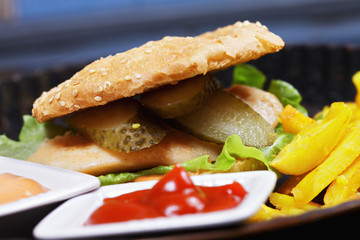 Hamburger with breast cutlet closeup