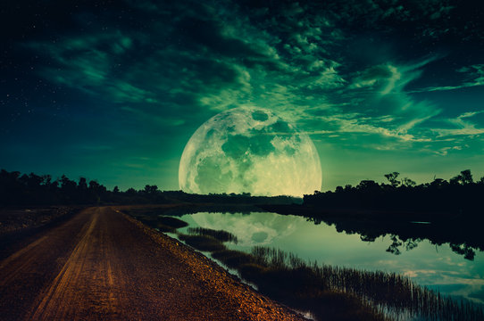 Landscape of sky with supermoon, many stars. Serenity background.