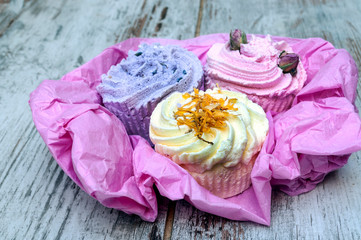 Cupcakes surrounded by rustic background