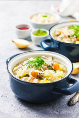 Sauerkraut red bean meat soup in pots.Selective focus, space for text.