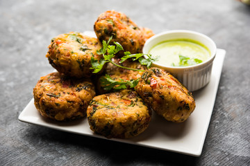 Crispy Corn Tikki, pakora/pakoda or pattice also known as cutlet. served with green chutney....