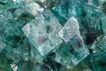 Macro mineral stone Fluorite on a white background
