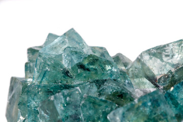 Macro mineral stone Fluorite on a white background