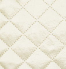 Glossy fabric texture with diamonds