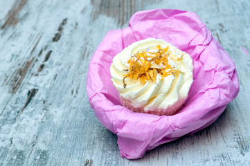 Cupcakes surrounded by rustic background