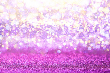 Purple glitter lights texture bokeh abstract background. defocused