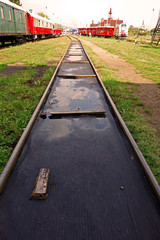 The track leading to the train repair hall
