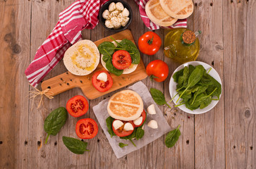Tigella bread with spinach and tomatoes.