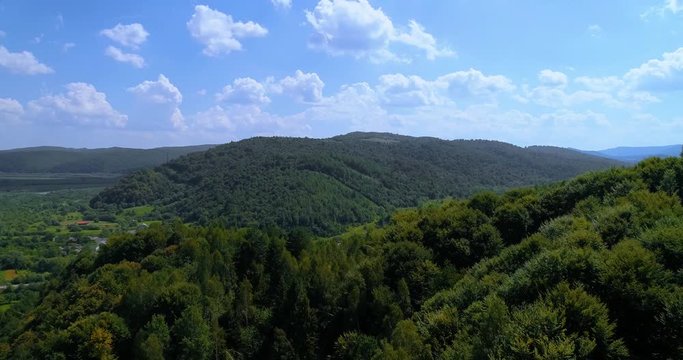 beautiful landscape village in the mountains aerial 4k 50p