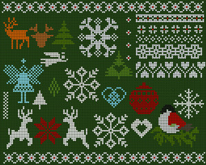 Set of knitted elements, ornaments, snowflakes and other Christmas decoration on a green background