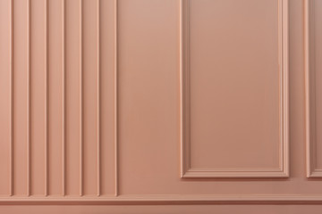 Composition of wood moulding in classic detail installed on pink painted wall / background image / texture - obrazy, fototapety, plakaty