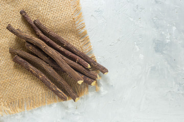 pieces of licorice root on the table - Glycyrrhiza glabra