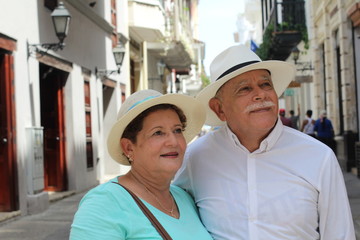 Lovely senior Hispanic couple outdoors close up