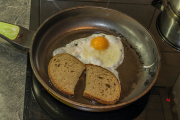 Fried bread with egg sausage cheese and garlic