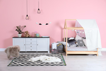 Modern child's room interior with cute bed