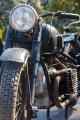 Fototapeta premium Close-up of motorcycle parked on city street