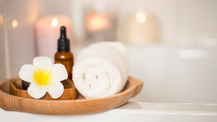Spa setting with flower and towel, skincare treatment home spa