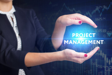 The concept of business, technology, the Internet and the network. A young entrepreneur working on a virtual screen of the future and sees the inscription: Project management