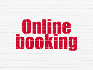 Tourism concept: Painted red text Online Booking on White Brick wall background