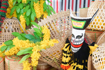 Phi Ta Khon. Ghost mask and colorful costume of Phi Ta Khon Ghost Festival. The festival is...