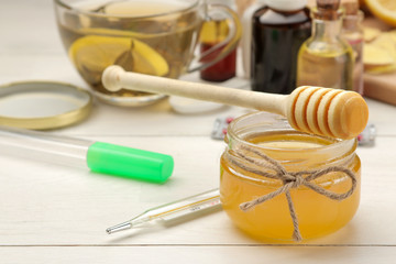 Various medicines for flu and cold remedies on a white wooden table .. Cold. diseases. cold. flu.