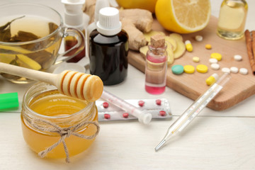 Various medicines for flu and cold remedies on a white wooden table .. Cold. diseases. cold. flu.