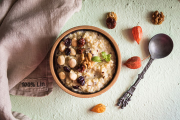 Homemade porridge with nuts and berries - 233227495