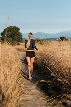 Beautiful Athletic Woman Running Outdoor