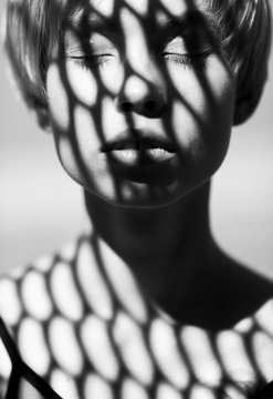 Close up of woman with shadows