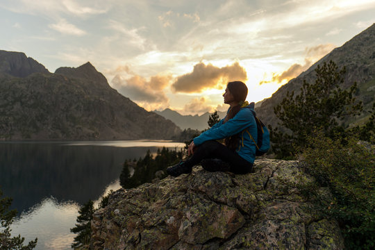 Female hiker in an alpine scenery