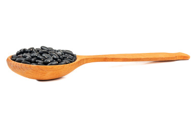 Black beans in spoon