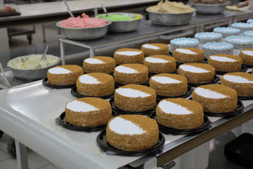 Freshly baked confection in bread and sweets factory