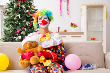 Funny clown in Christmas celebration concept 