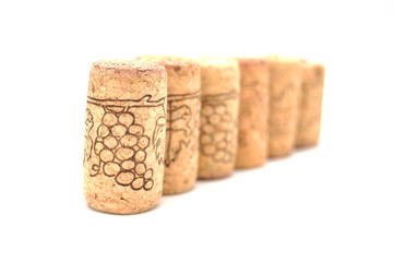 Wine bottle stoppers on white background close-up