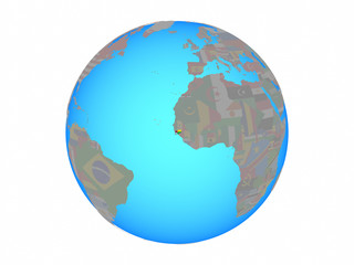 Guinea-Bissau with national flag on blue political globe. 3D illustration isolated on white background.