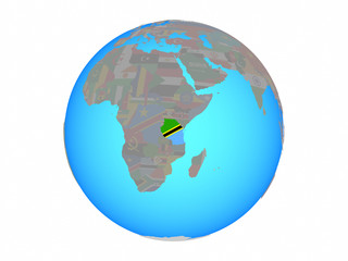 Tanzania with national flag on blue political globe. 3D illustration isolated on white background.