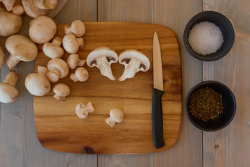 Champignon mushrooms on a cutting board