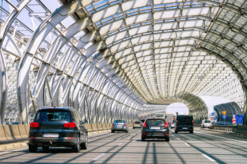 Car traffic at tunnel bridge in Warsaw in Poland