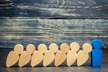 Leader businessman stops falling dominoes. Strong and reliable boss. Difficulties in business and...