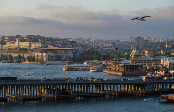 Evening view of the Golden Horn Bay with the Ataturk bridge on the background of a European part of Istanbul.