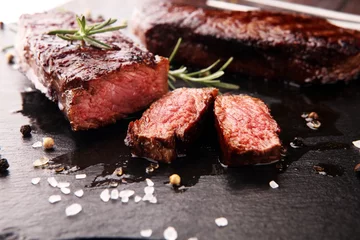 Tuinposter Steakhouse Barbecue Rib Eye Steak of rumpsteak - Dry Aged Wagyu Entrecote Steak